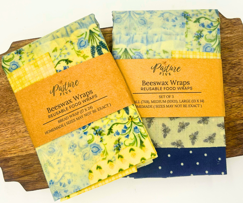 Set of beewax wraps with floral designs on a wooden surface