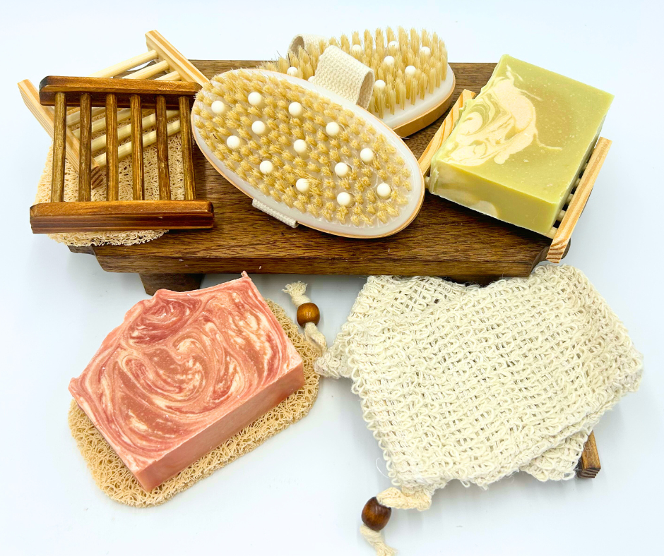 Two Soaps stands, soap brushes, soap bags, and two bars of soap on a stand with a white background.  