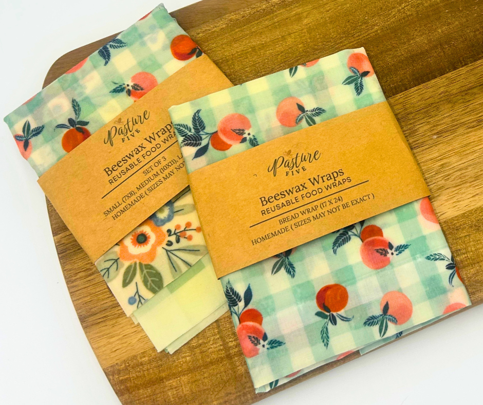 Beeswax wraps with floral designs on a wooden board