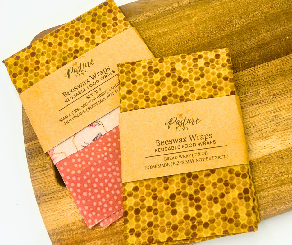 Beeswax wraps with packaging on a wooden surface