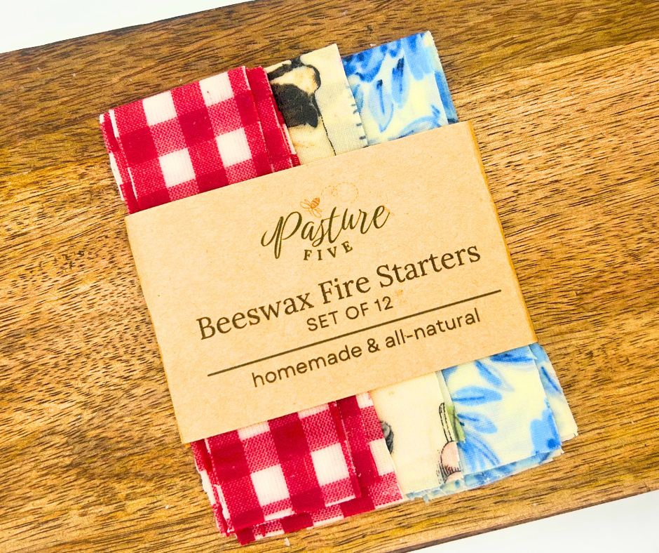 Beeswax fire starters set with a 'Pasture Five' label on a wooden surface