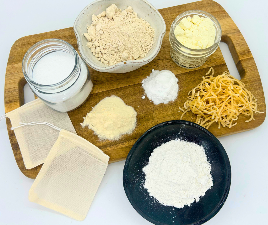 Various ingredients for the bath soaks on a board. 