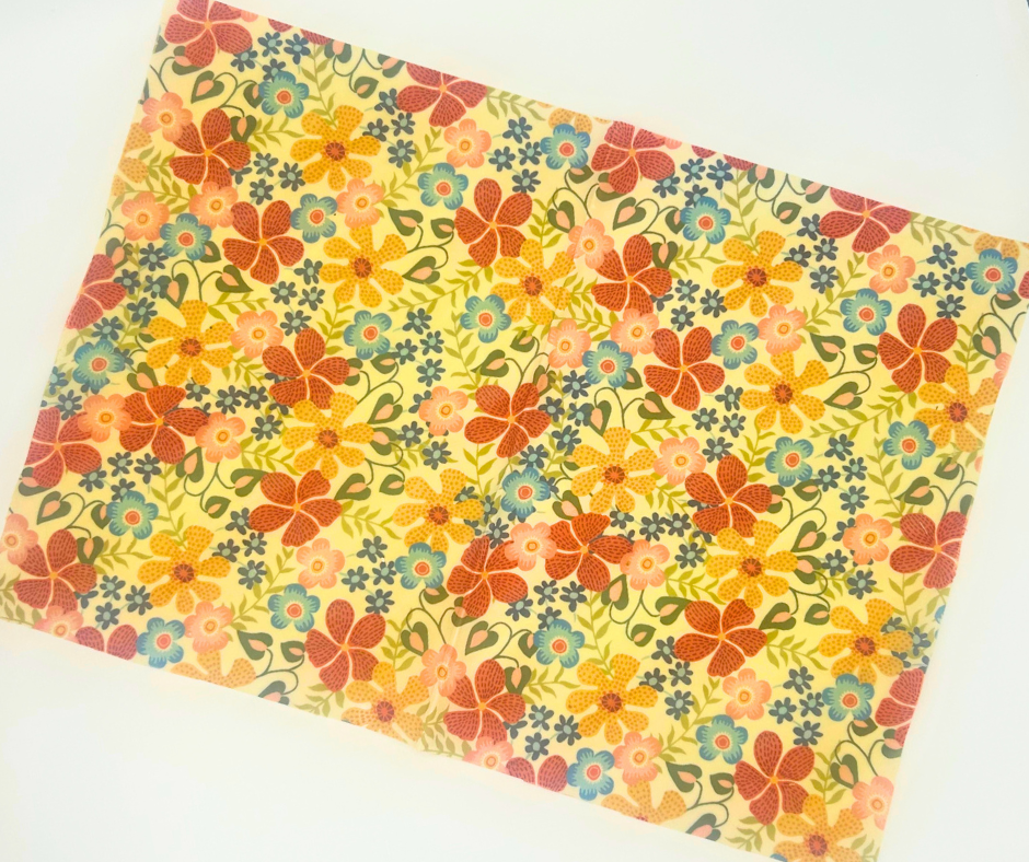 Floral patterned wax wrap with colorful flowers on a white background