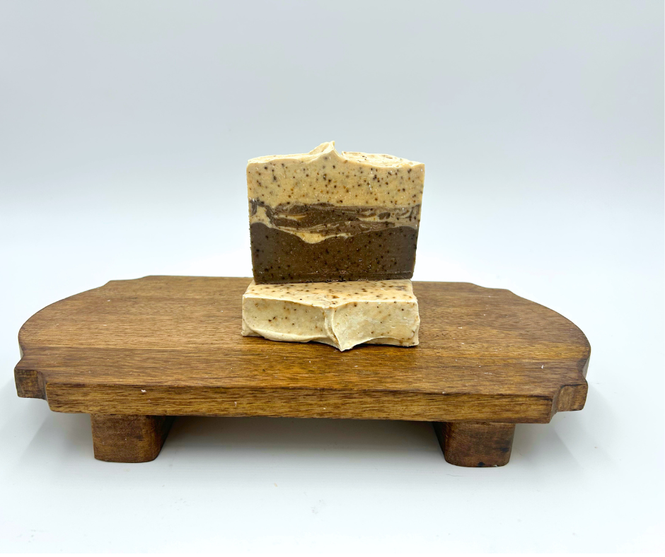 Two Fresh Brew Coffee Soap on a brown platform. Cream and Brown 