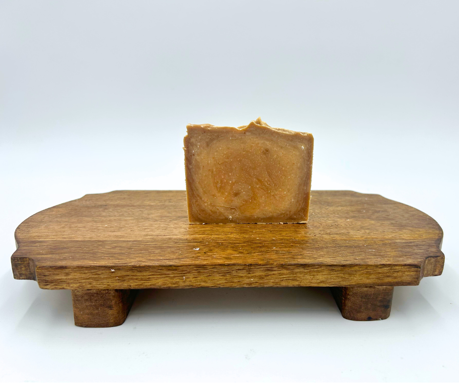 Brown swirl soap on brown platform
