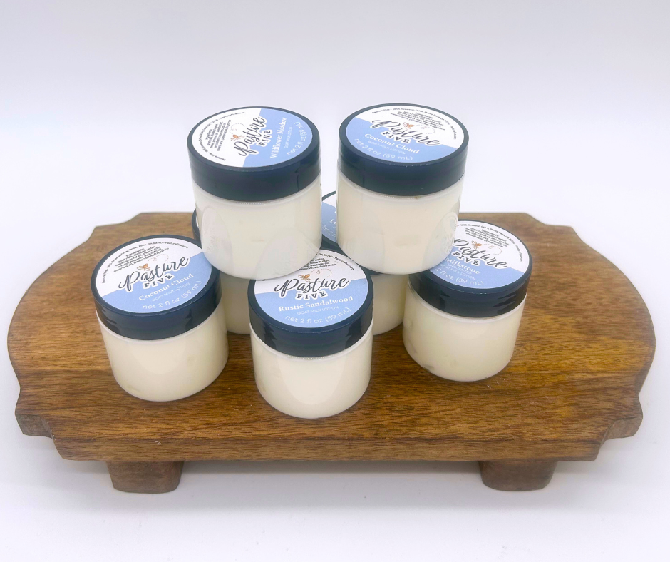 Jars of Mini Lotion on a wood board