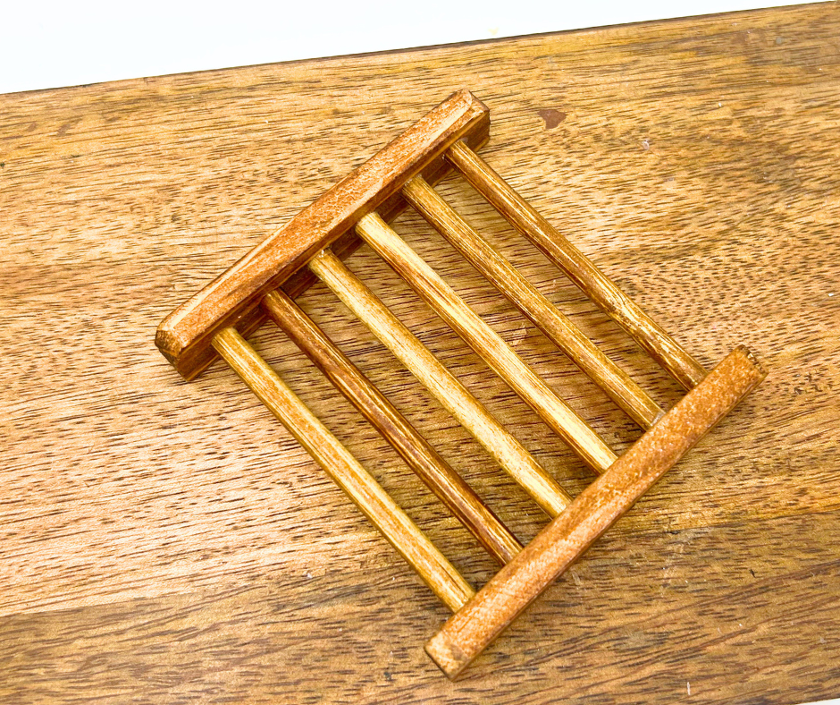 Wooden trivet on a wooden surface