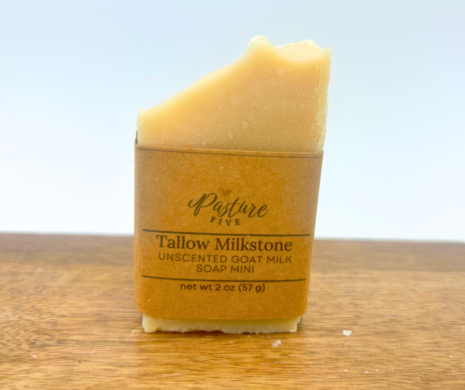 Mini Bar of soap with 'Pasture Five' branding on a wooden surface